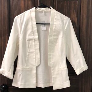 Maurice’s white blazer